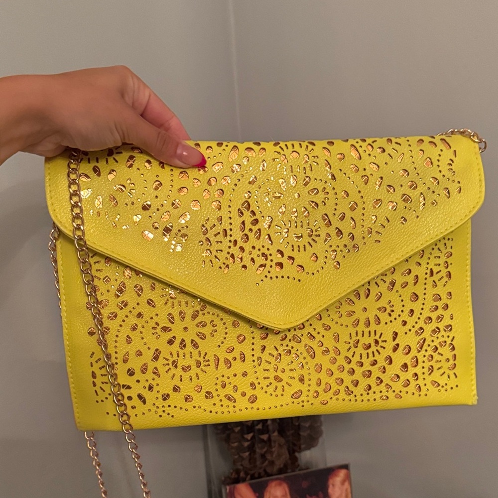 Elegant Yellow Laser-Cut Clutch with Chain Strap